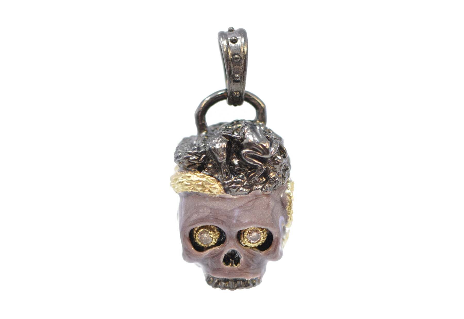 Introducing the 18k Yellow Gold and Grey Sterling Silver Skull Enhancer with Seductive Poetry Enamel and 0.22 CT Champagne Diamonds. This unique, one-of-a-kind piece is a timeless accessory that will add bold sophistication to your look. The skull enhancer is crafted with 18k yellow gold and grey sterling silver and features seductive poetry enamel details for added flair. To complete the look, it is embellished with 0.22 CT of champagne diamonds for a touch of sparkle. Wear this skull enhancer as an eye-catching focal point to your outfit and make a statement on any occasion. SEDUCTIVE POETRY ENAMEL SKULL ENHANCER