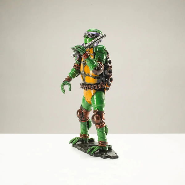 Closeup photo of 9.5" Donatello Ninja Turtle Inspired Recycled Metal Sculpture