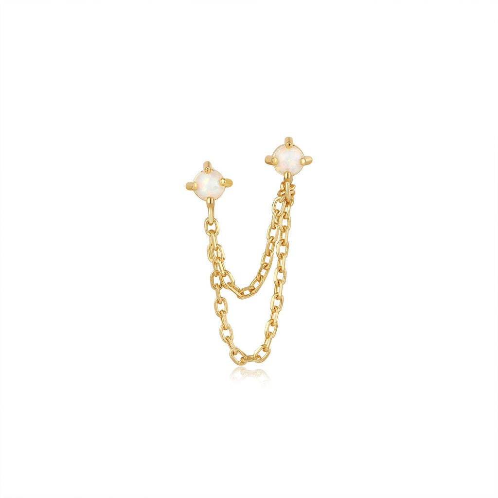 Add the chain trend to your must-have ear party list this season with this unique barbell from the new collection. Doubling up on stud action, this is the perfect piece for those with multiple piercings in one ear. Style it from your lobe and up the ear to create some dimension and wear it next to sparkling studs for night-out vibes.• Stud size: 2.5mm• Drop size: 20mm• Post length: 7.5mm• Weight: 0.7g Gold Kyoto Opal Drop Chain Barbell Single Earring