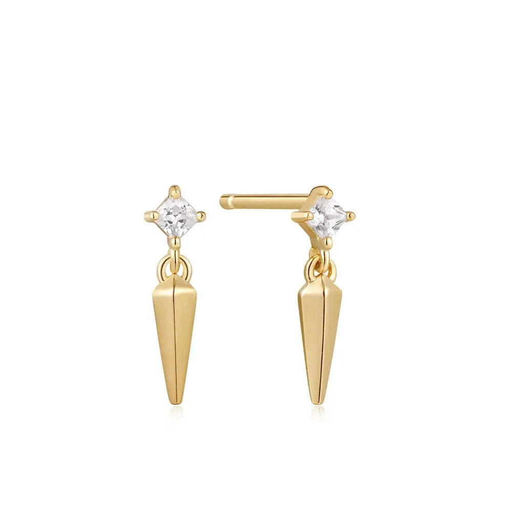 Let your ear stack shine this season with our beautifully crafted drop-spike studs. Balancing a shiny gold spike drop with a shimmering faceted cubic zirconia stone, they’re perfect for anything from a big night out to a romantic date night. Pair yours with a row of simple studs to let the stones take centre stage. SPARKLE SPIKE STUD EARRINGS