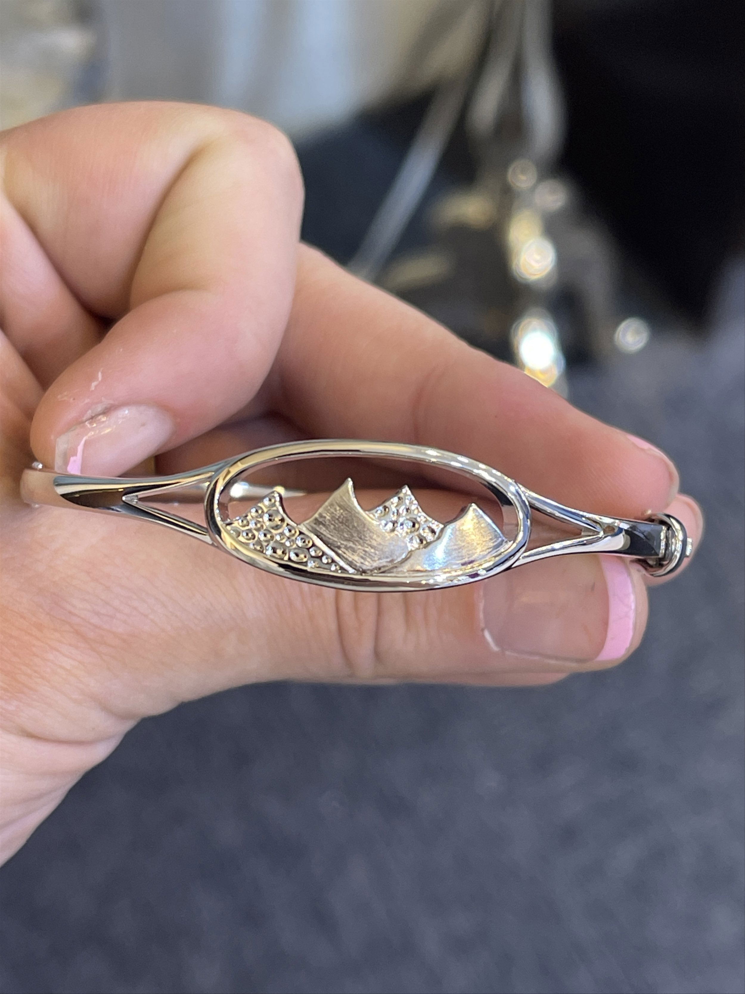 1inch width, 1/2 height Sterling silver Large Oval Hammered Mountain bracelet w/ cubic zirconium