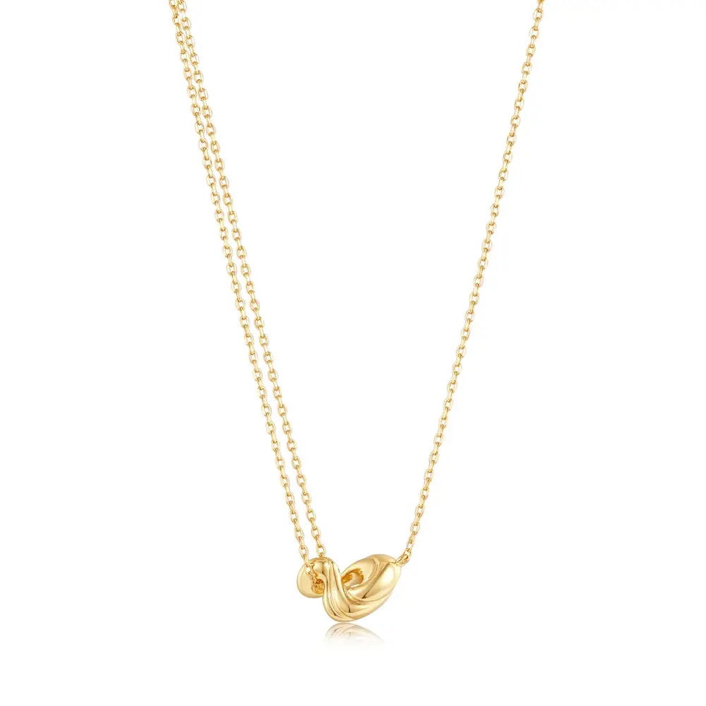 Product Description:Give your jewellery collection an on-trend update with this statement pendant from the Taking Shape collection. Crafted in 14k gold-plated sterling silver, the unique double chain design is finished with a twisted wave mini pendant detail. Layer yours with your favourite delicate pendants and chic chains to create your new-season stack.Product Details:• Material: 925 Sterling Silver with 14kt Gold Plating• Necklace Length: 400mm with 50mm extender• Weight: 4.3g Gold Twisted Wave Mini Pendant Necklace
