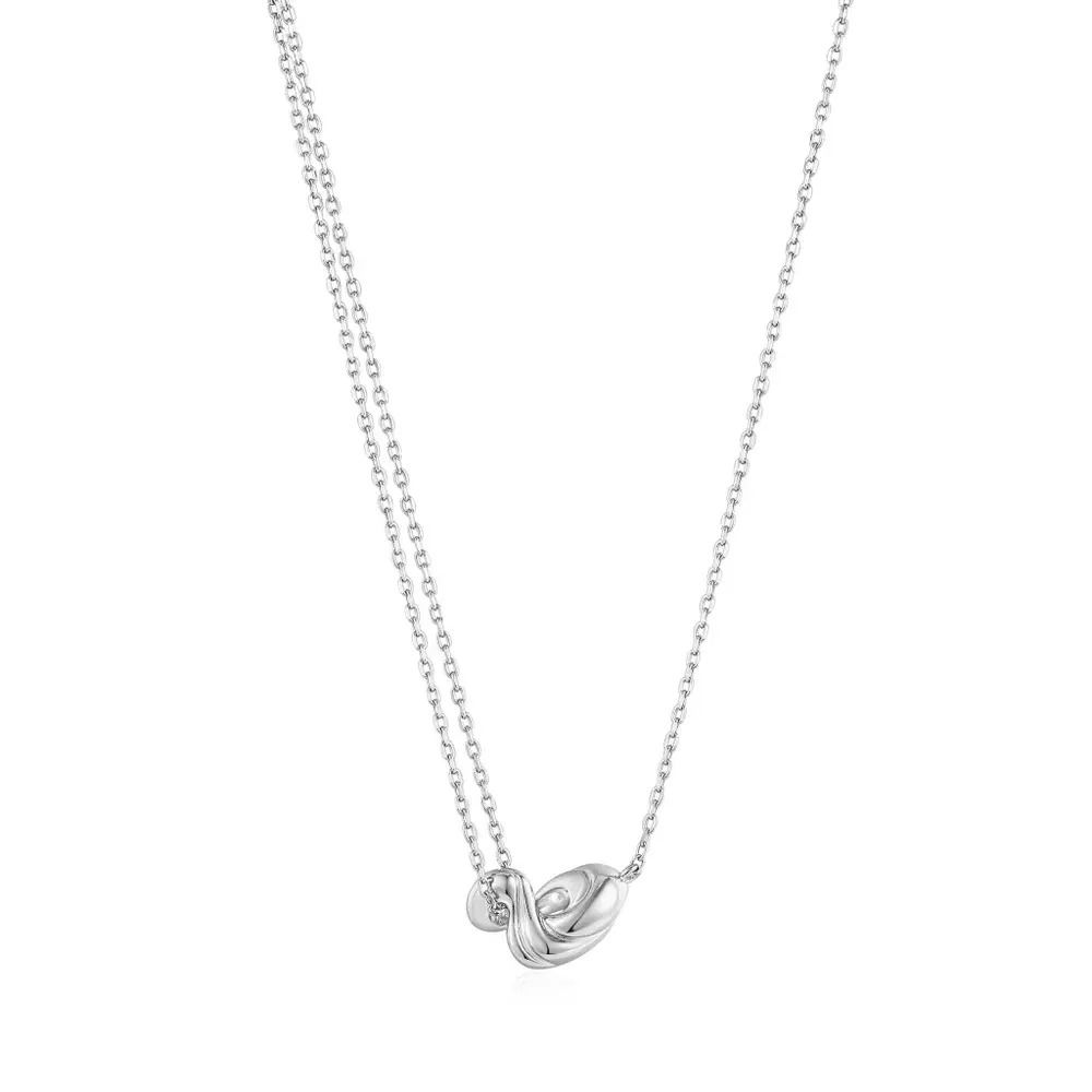 Give your jewellery collection an on-trend update with this statement pendant from the Taking Shape collection. Crafted in 14k gold-plated sterling silver, the unique double chain design is finished with a twisted wave mini pendant detail. Layer yours with your favourite delicate pendants and chic chains to create your new-season stack.• Material: 925 Sterling Silver with Rhodium Plating• Necklace Length: 400mm with 50mm extender• Weight: 4.3g Silver Twisted Wave Mini Pendant Necklace