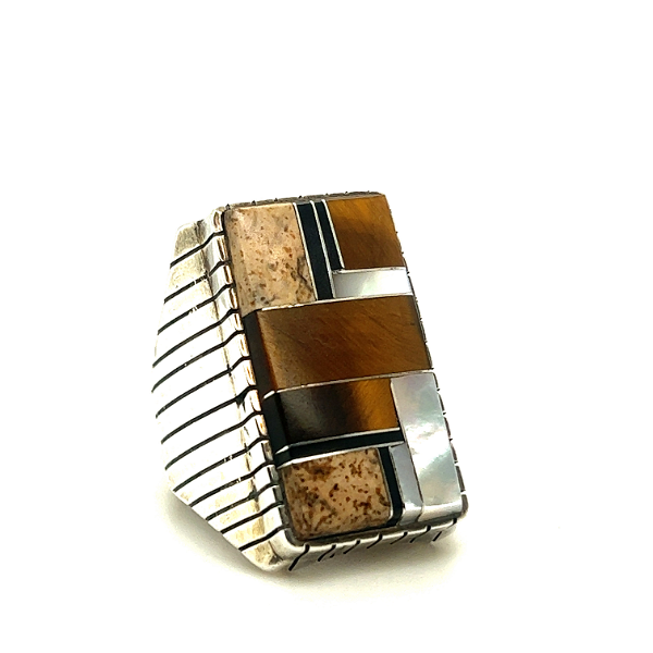 Closeup photo of Sterling Silver Native American Men’s Ring with Tiger eye, Mother of Pearl, and Onyx