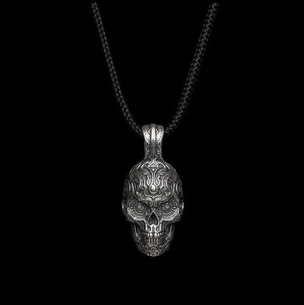 Closeup photo of RENEGADE - Sculpted sterling silver skull pendant