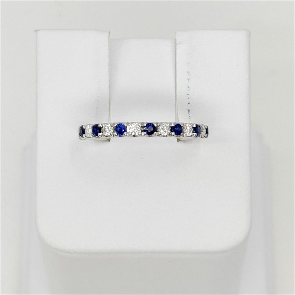 Closeup photo of sapphire and diamond band, 6 round diamonds 0.15ct, 7 sapphires 0.23ct, 14kw