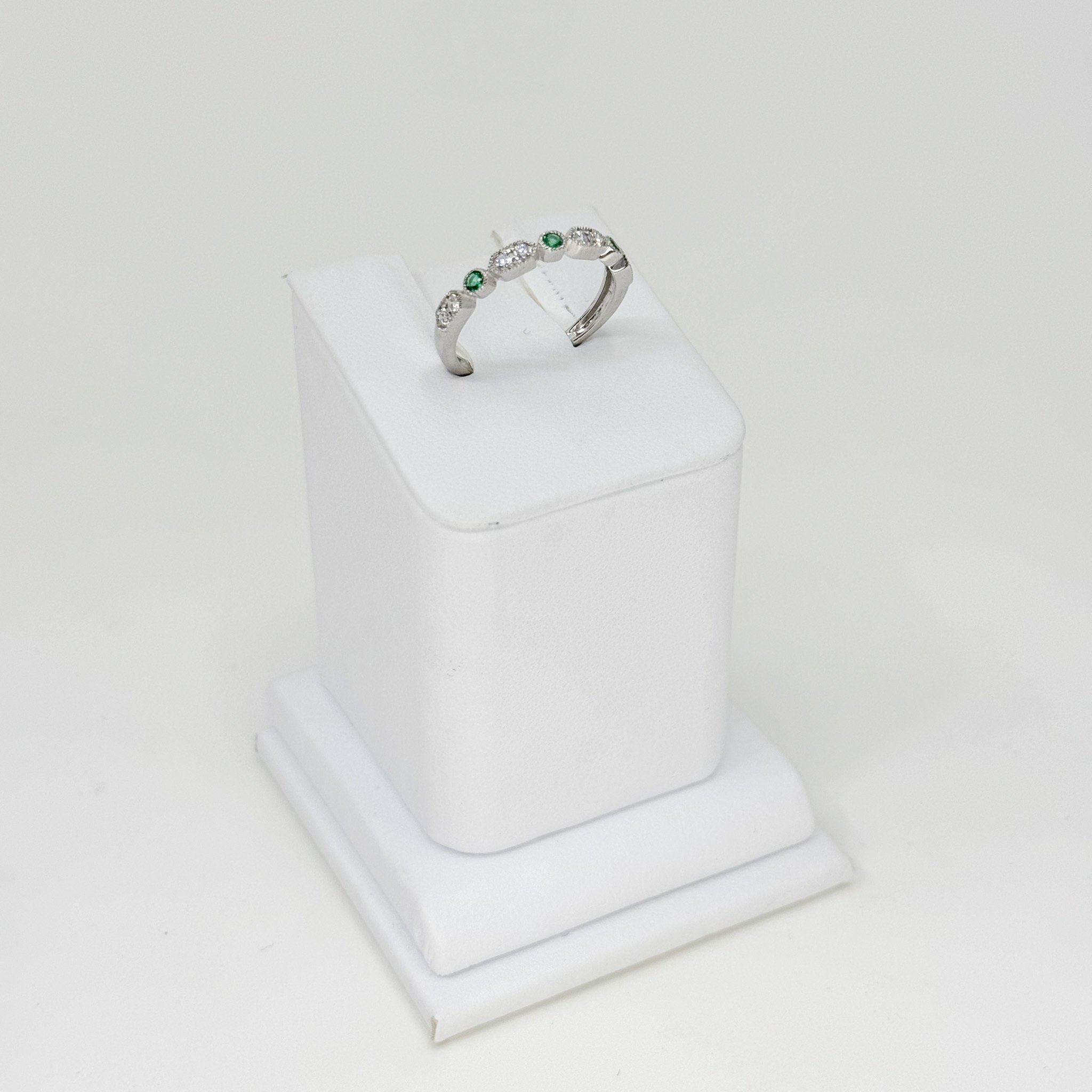 Emerald and Diamond Band, 3 emeralds 0.11ct, 8 round diamonds 0.18ct, 14kw