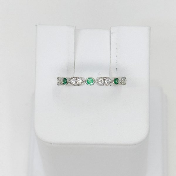Closeup photo of Emerald and Diamond Band, 3 emeralds 0.11ct, 8 round diamonds 0.18ct, 14kw