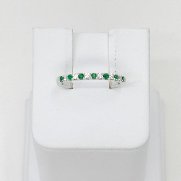Closeup photo of Alternating emerald and diamond band 7 emeralds 0.15ct, 6 round diamonds 0.11 ct, 14kw