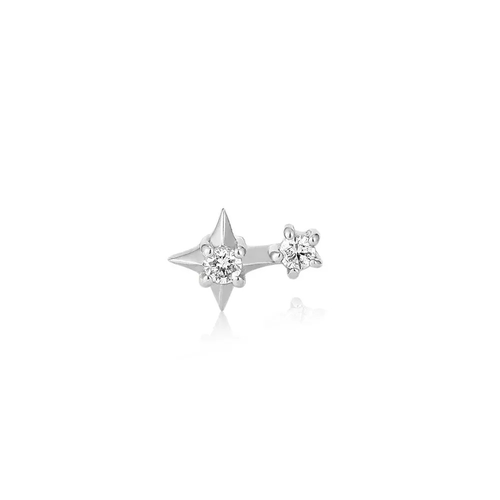 Inspired by a burst of stars in the night’s sky, this simple stud will keep you shining. Add this piece for a charming touch of celestial magic to your ear stack. ADARA | Double Diamond Starburst Threadless Flatback Earring