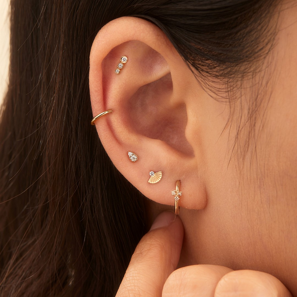 A fan shaped design is complemented by a natural white diamond. This single stud will be an eye-catching addition to your daily ear adornment KATE | Single Diamond Fan Threadless Flatback Earring