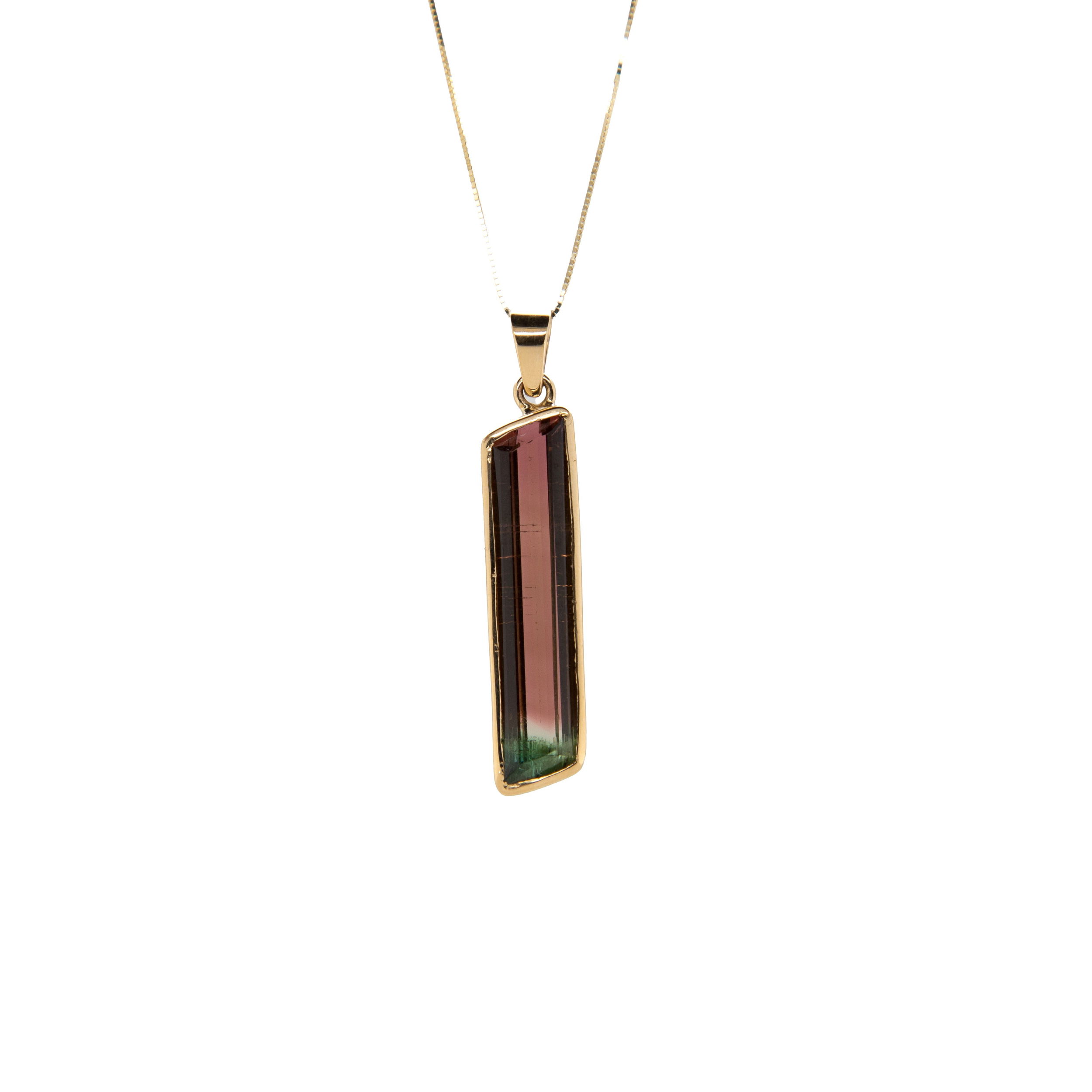Material: 14k yellow goldStone Type: bi-color watermelon tourmaline Stone Size: 14.22ct 14k BAGUETTE CUT BICOLOR TOURMALINE NECKLACE