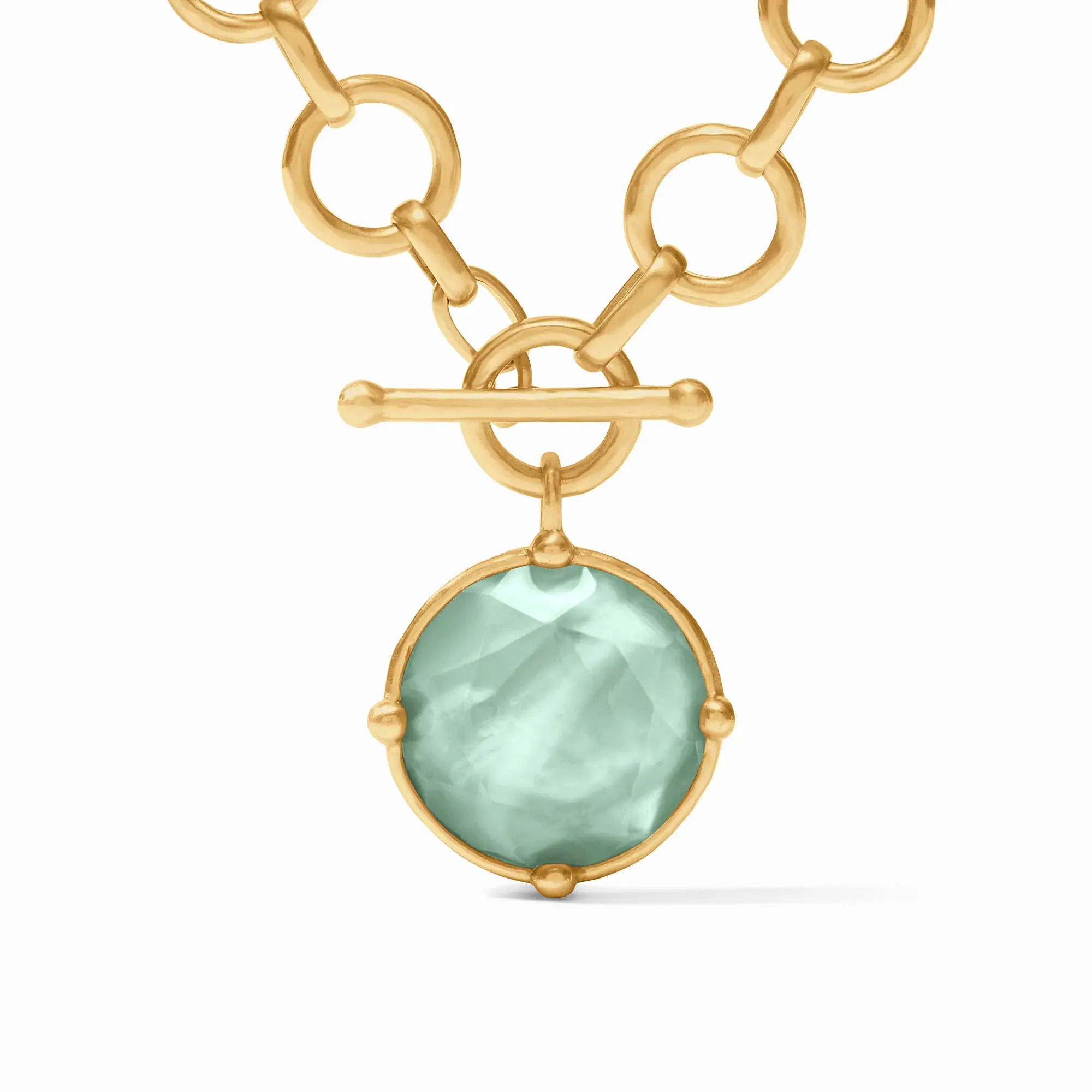 Lustrous, lightly hammered links lead to a round precision-cut statement gemstone embellished with a cameo bee on the reverse side. Honeybee Statement Necklace