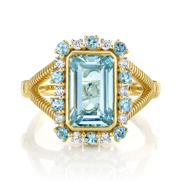 Closeup photo of SLOANE STREET EMERALD CUT SKY BLUE TOPAZ RING WITH SWISS BLUE TOPAZ AND DIAMOND HALO