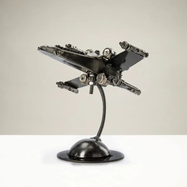 Closeup photo of X-Wing Inspired Recycled Metal Sculpture