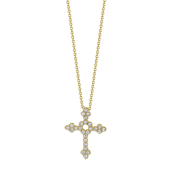 Closeup photo of 18k Yellow Gold Cross with White Diamond Detail