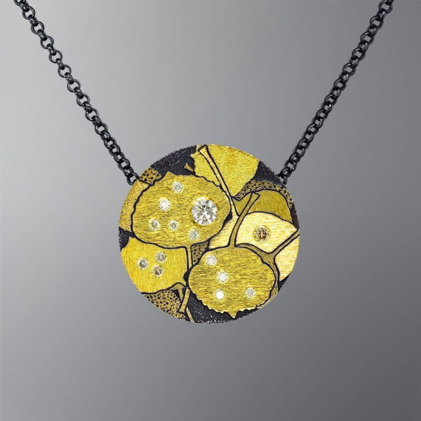 Closeup photo of Aspen Leaves Connecting to Earth with 3.3 MT Sapphire and Diamonds Pendant