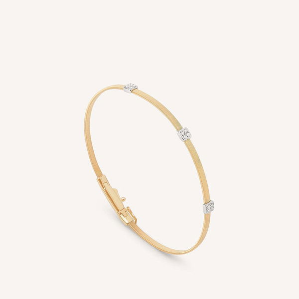 Closeup photo of 18K Yellow Gold Small Stackable Bracelet With Diamonds – Marco Bicego