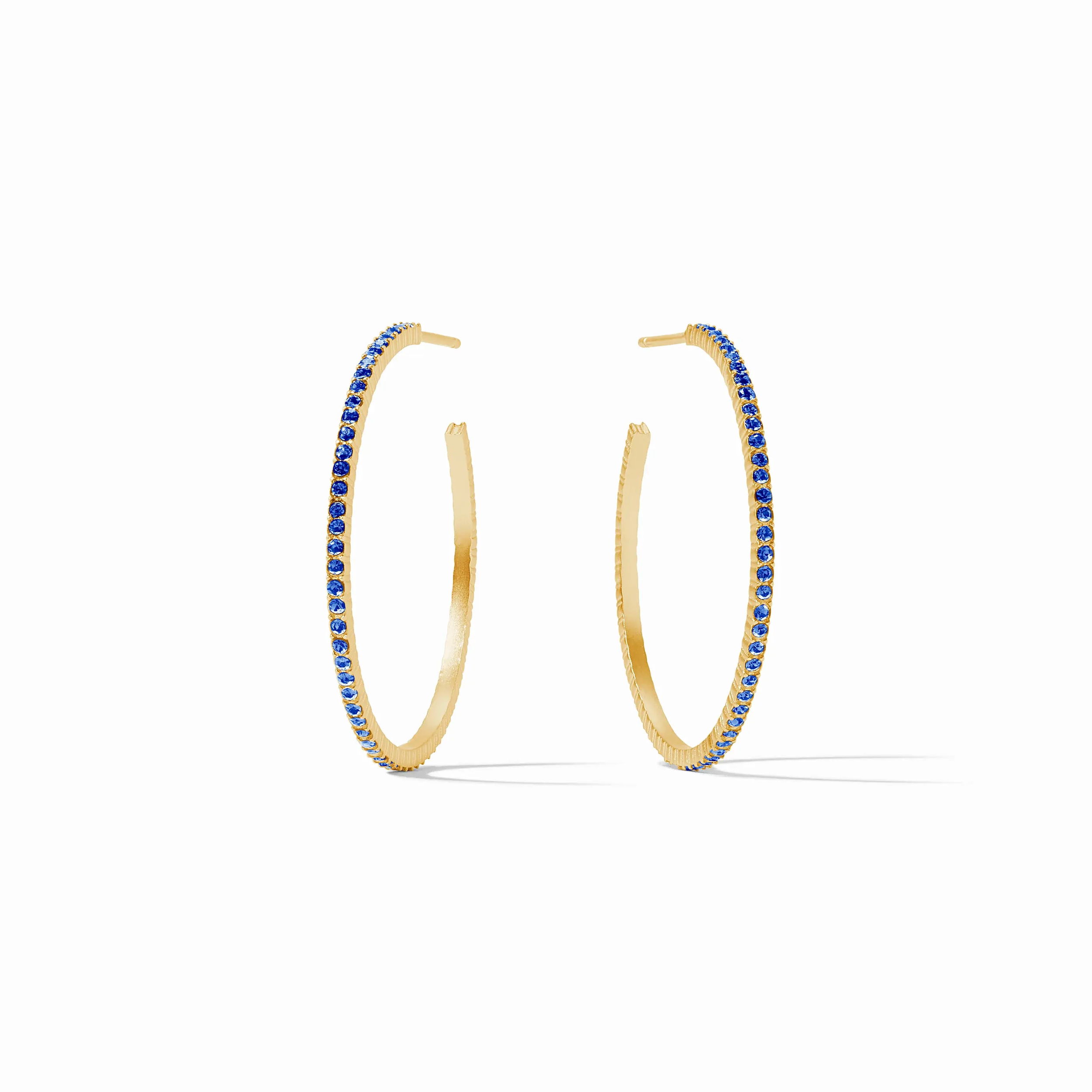 Sparkle and shine in a pair of striking CZ hoop earrings adorned with pavé CZ. These slender, thin hoops are available in four different sizes. Windsor Hoop