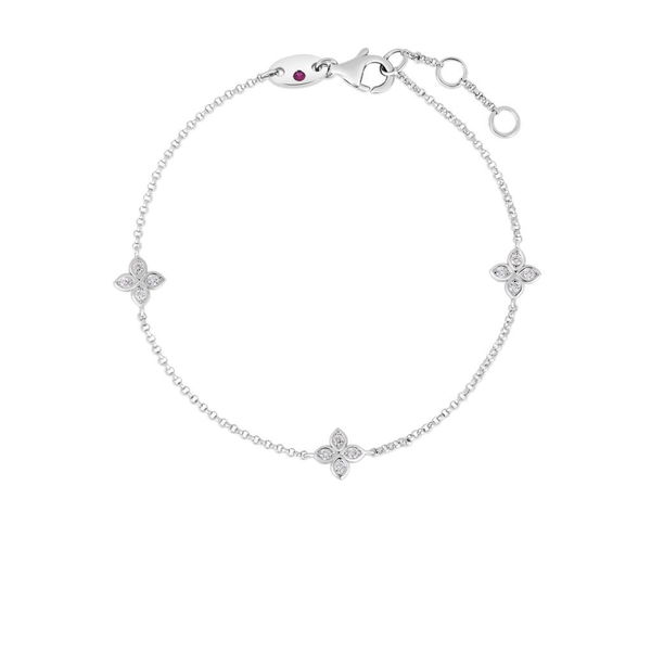 Closeup photo of 18K WHITE GOLD LOVE BY THE INCH 3 STATION FLOWER BRACELET
