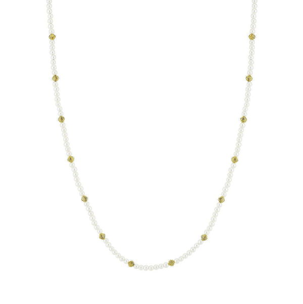 Closeup photo of Pearl Necklace With Gold Strie Stations