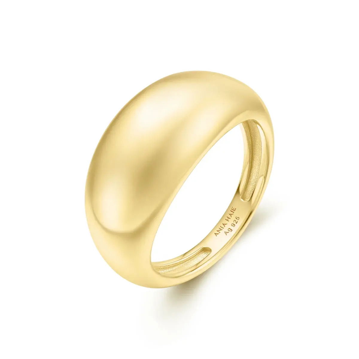 Sophisticated and endlessly refined, Vogue Maven is here for those who believe in understated luxury. Whether it's a business meeting or a special event, this look ensures you make a lasting impression with its timeless elegance. This statement dome ring embodies bold minimalism, featuring a large, smooth surface that exudes a strong, avant-garde presence. Designed to be worn solo or stacked with other pieces, it adds a touch of modern sophistication and undeniable impact to any ensemble.Details:Material: 925 Sterling Silver with 14kt Gold PlatingSize: 7 GOLD BOLD DOME RING