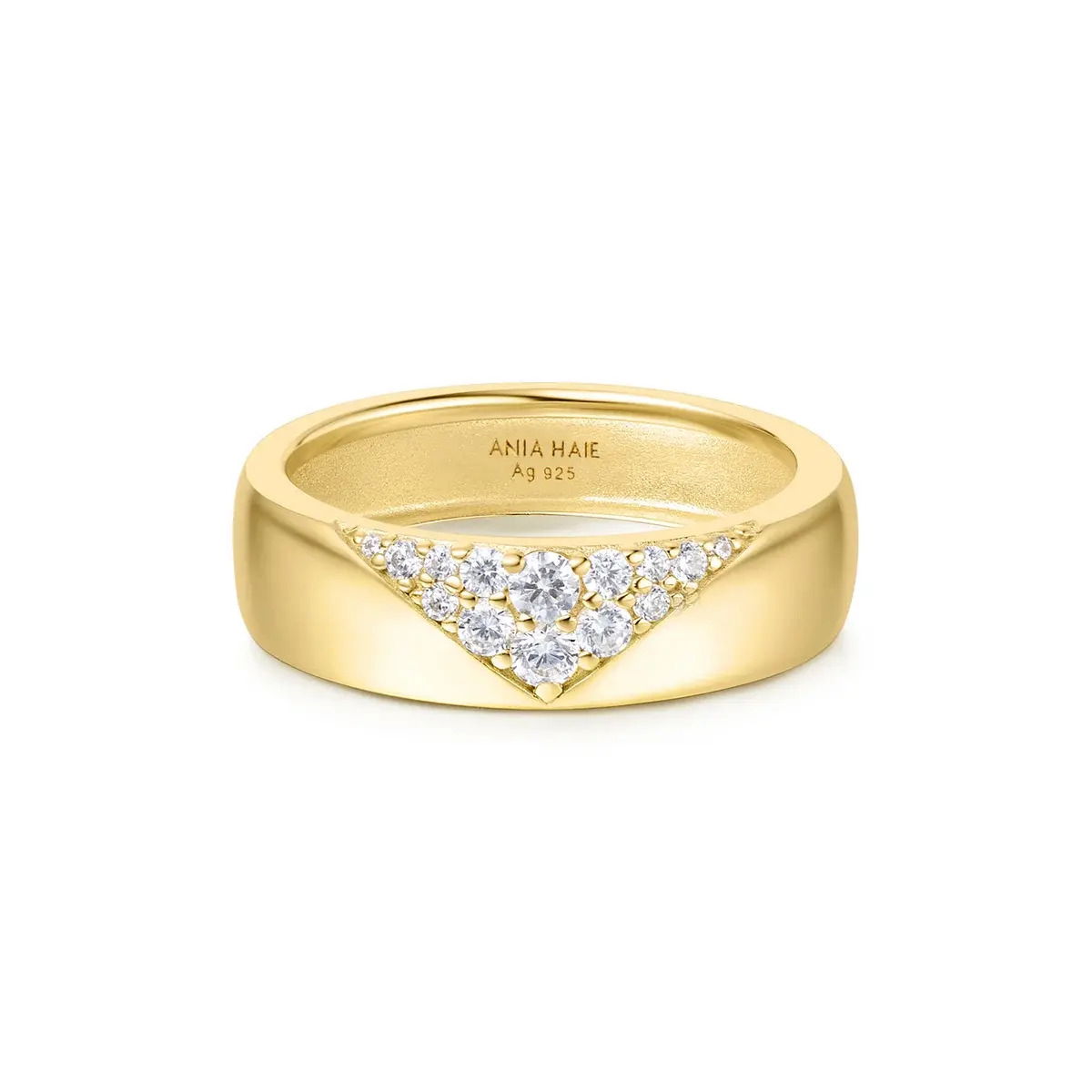 Sophisticated and endlessly refined, Vogue Maven is here for those who believe in understated luxury. Featuring cubic zirconia stones meticulously arranged in a triangular pattern, this piece is crafted for your leisure moments and formal occasions, offering a unique blend of distinctive style and fashion sense. The intricate detailing and sparkling stones add a touch of sophistication, making it a versatile addition to any ensemble.Details: Material: sterling silver with 14kt gold platingSize: 7Stone Type: cubic zirconia GOLD PAVÉ STATEMENT RING
