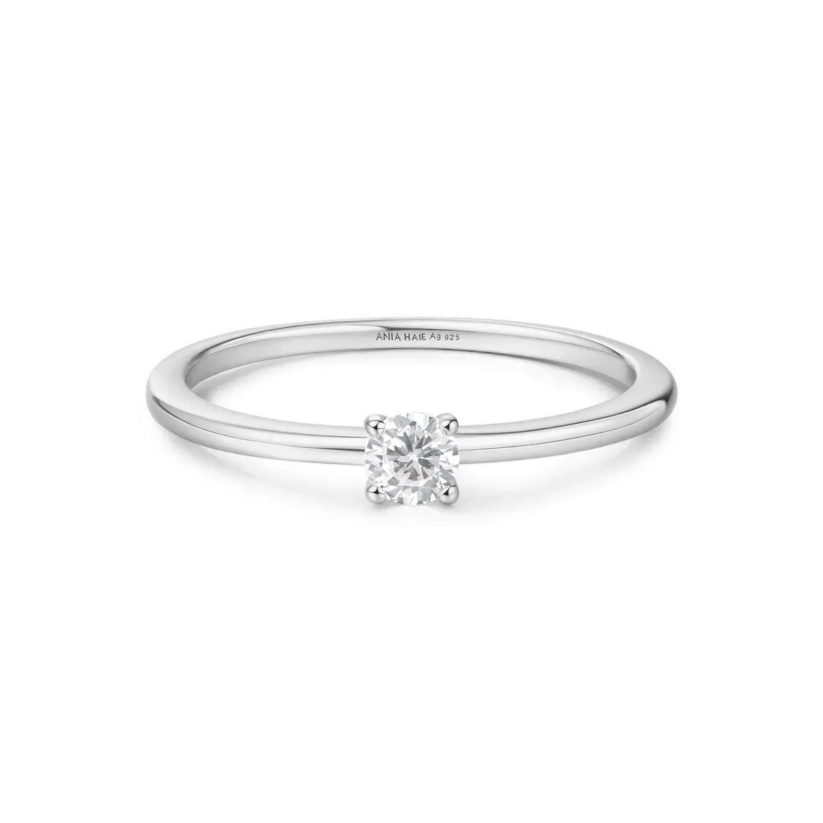 Elevate your style with the slim stacking ring. This sleek and versatile ring features a cubic zirconia as the centrepiece, making it perfect for everyday wear. Mix and match it with other pieces to create an eye-catching and classic look.Details: Material: sterling silver with rhodium platingSize: 7Stone Type: cubic zirconia SILVER CLASSIC SLIM STACKING RING