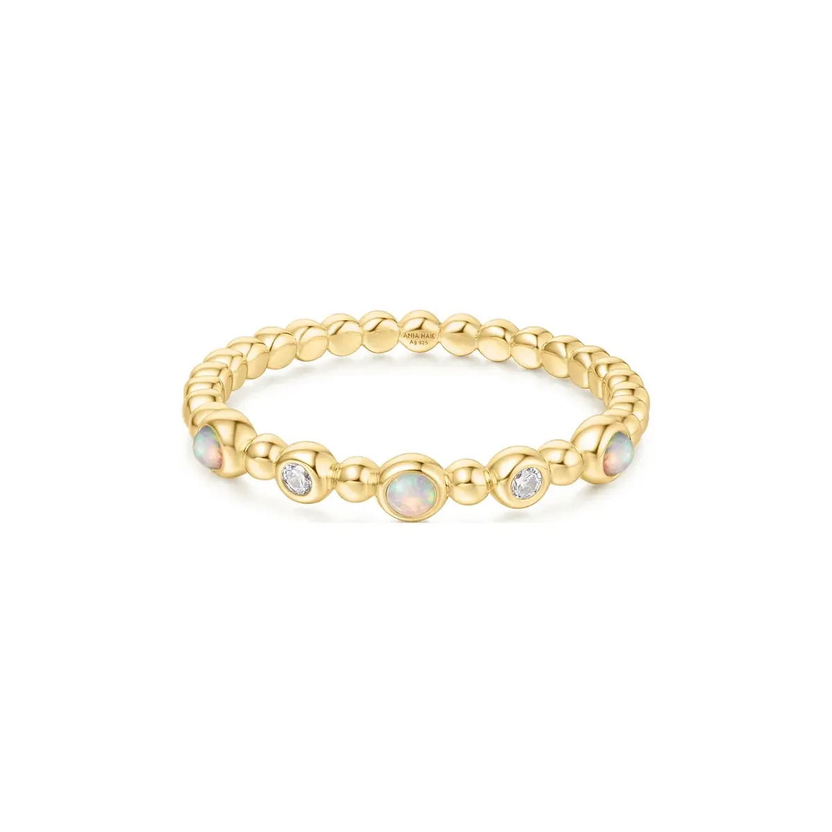 Embrace colour, light, and playful styling with Sunny Sparkler. Perfect for casual outings and relaxed days, this ring features multiple round beads with bezel-set opals and cubic zirconia, adding a dreamy and romantic vibe to any outfit. Mix and match it with other pieces for a personalized look.Details: Material: sterling silver with 14kt gold platingSize: 7Stone Type: kyoto opal and cubic zirconia GOLD BEZEL KYOTO OPAL BEADED RING