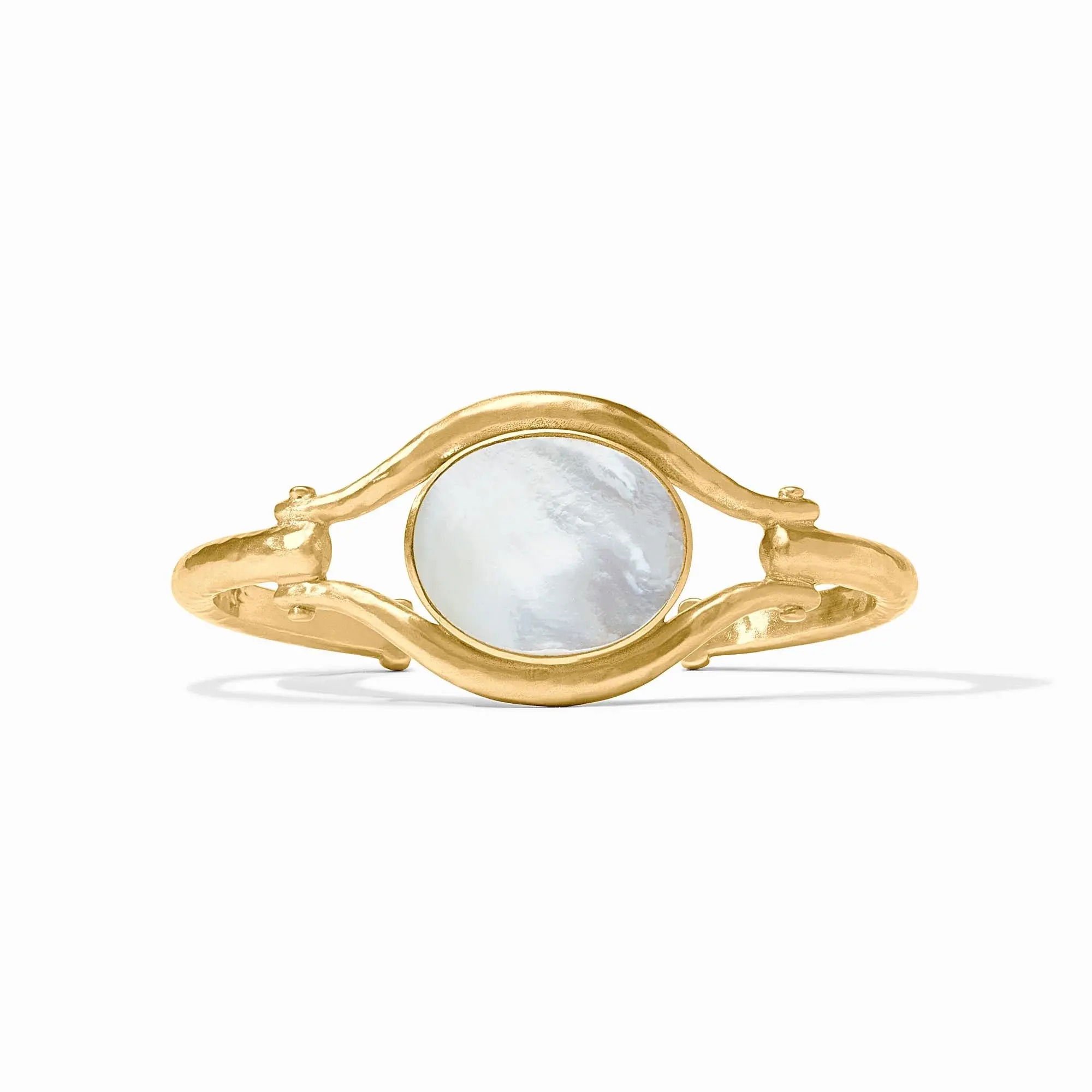 This elegant cuff pays homage to the equestrian spirit with a shimmering mother of pearl disc cradled between two elongated golden bridle rings. Saratoga Stone Cuff