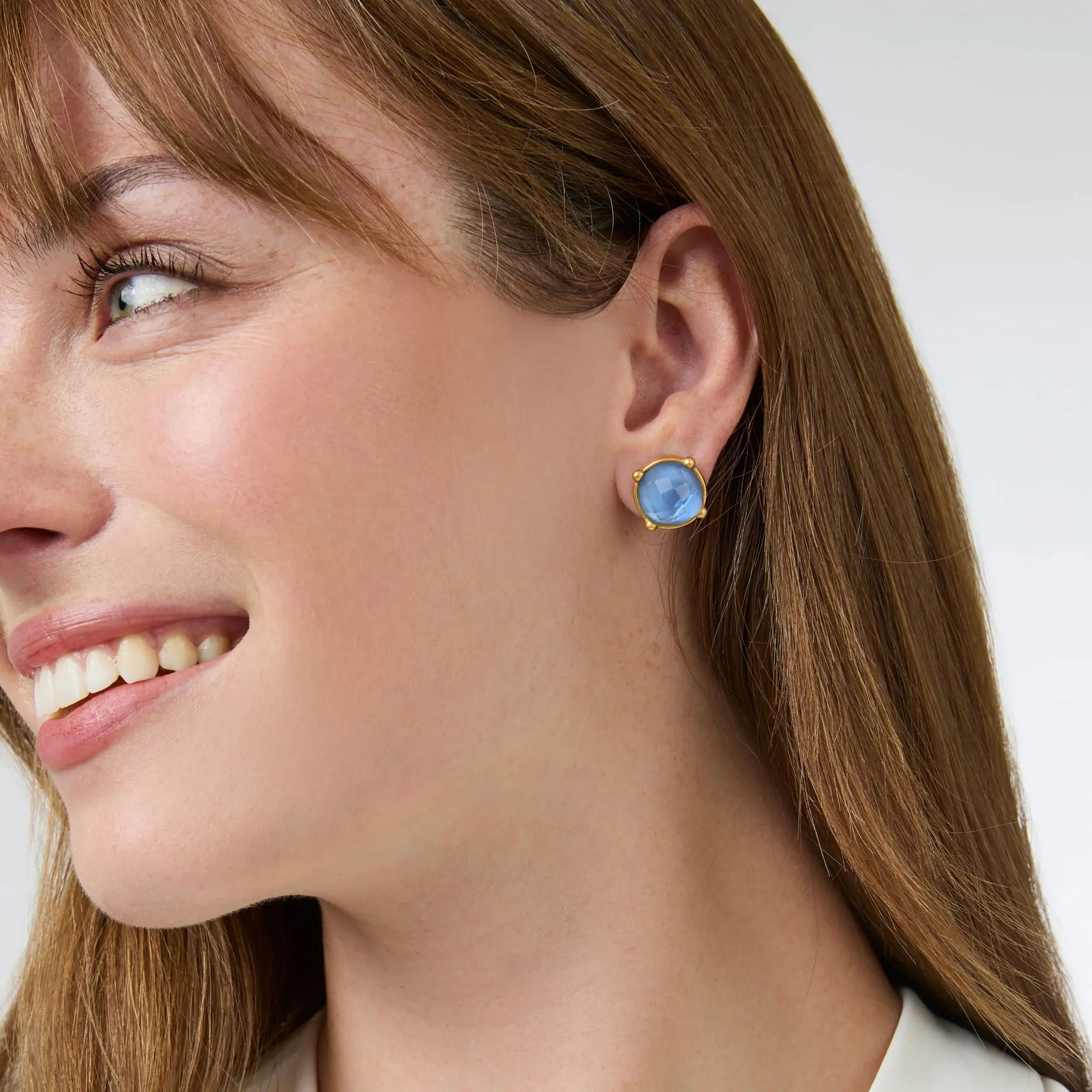 Rose cut sparkling gemstone of imported glass. Lightly hammered bezel setting with gold raised beads. Honey Stud