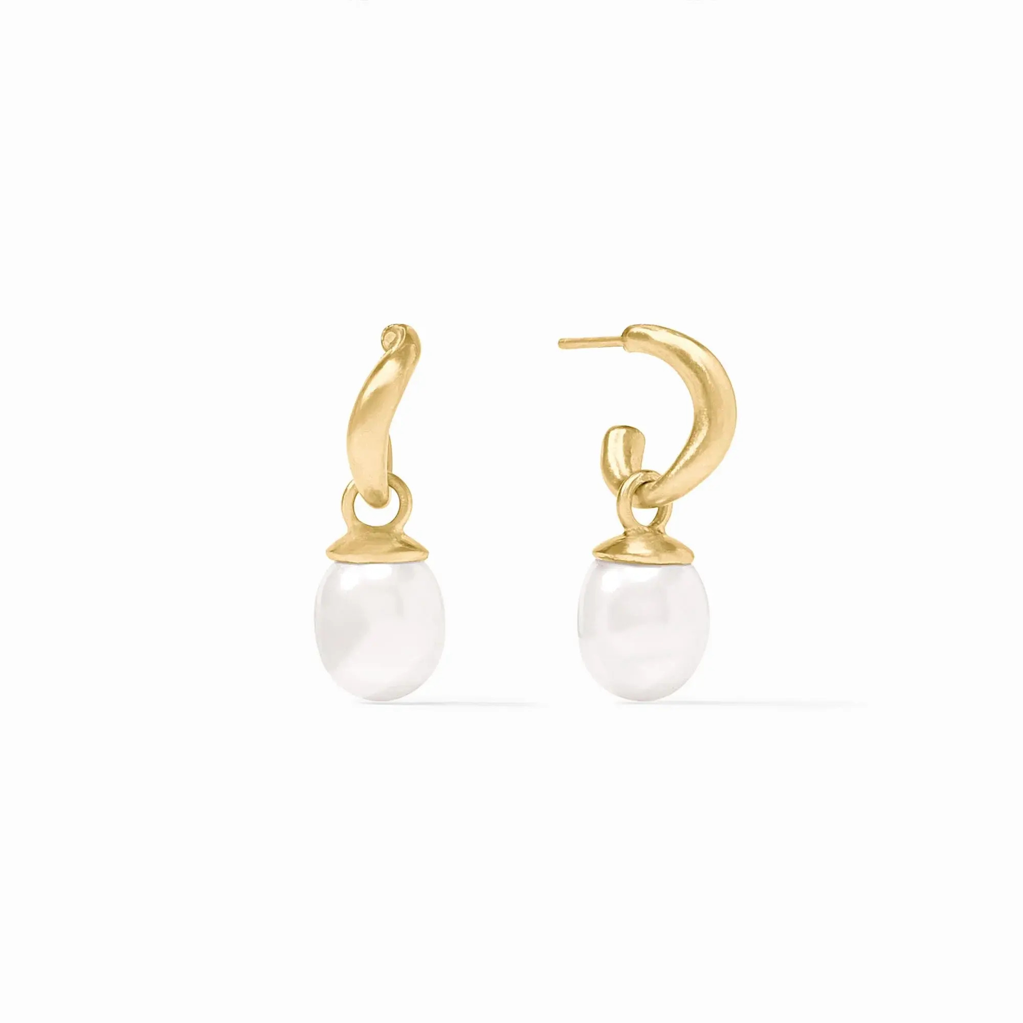 Pear-shaped pearls dance and dangle beneath curvaceous, undulating golden huggie hoops. Wave Hoop & Charm Earring