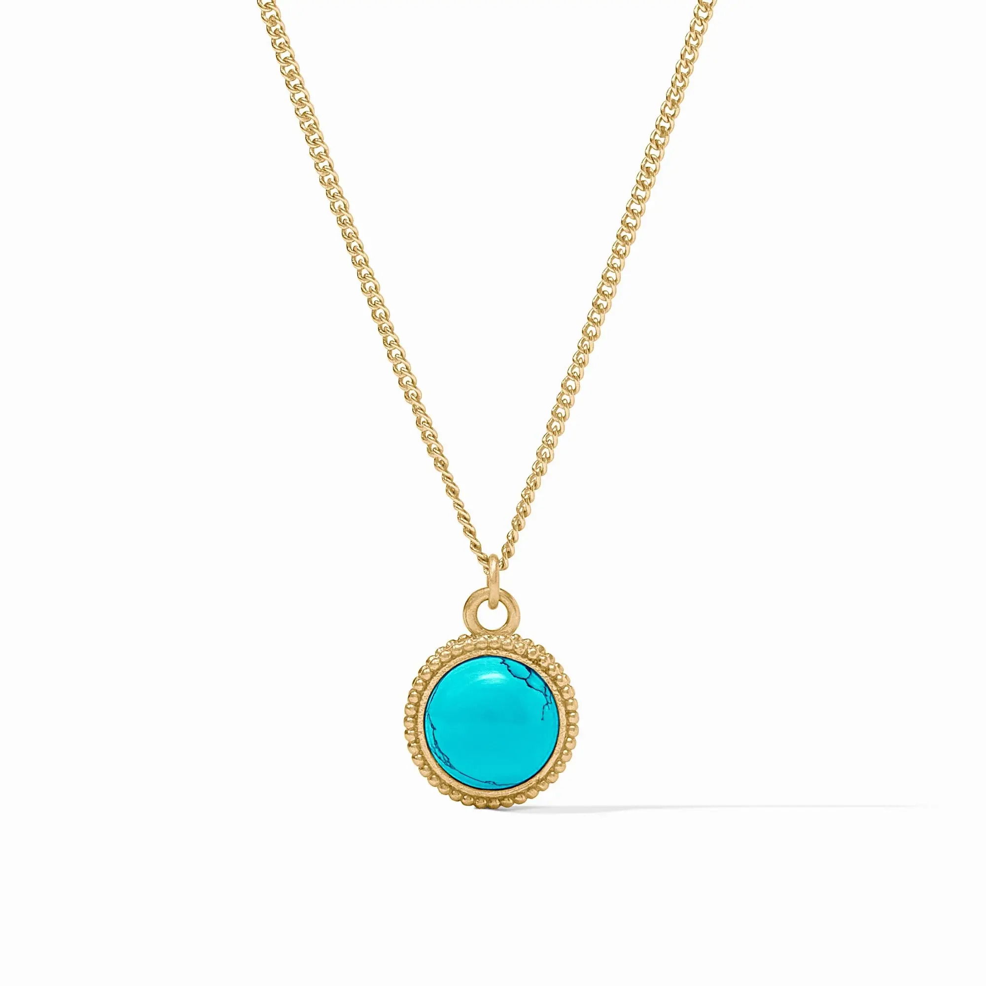 One necklace, two ways to wear it—one side features a glittering gemstone, while the reverse side features a fleur-de-lis intaglio. Fleur-de-Lis Solitaire Necklace