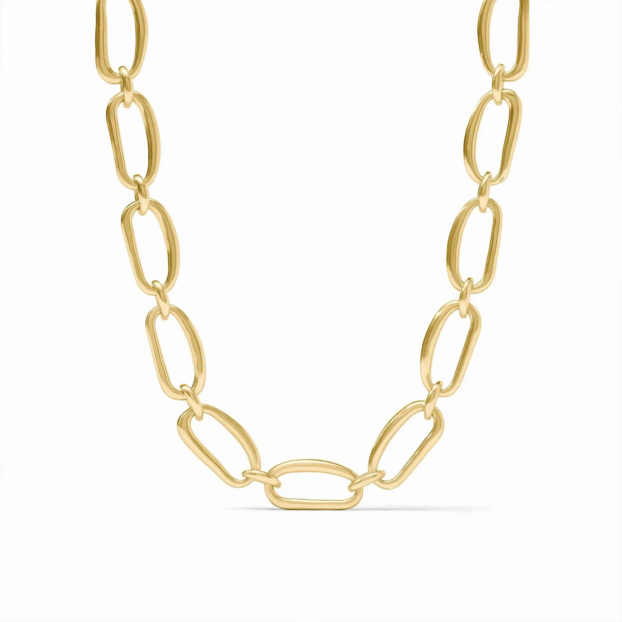 A necklace of undulating oblong links resembling hand-stretched golden rings, connected by curvaceous loops and featuring an adjustable toggle closure. Wave Link Necklace