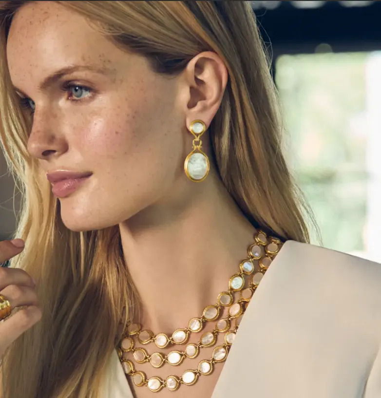 This necklace gives a subtle nod to equestrian tradition with golden bridle rings inset with mother of pearl discs, and featuring an adjustable yoke-shaped toggle closure. Saratoga Tennis Necklace