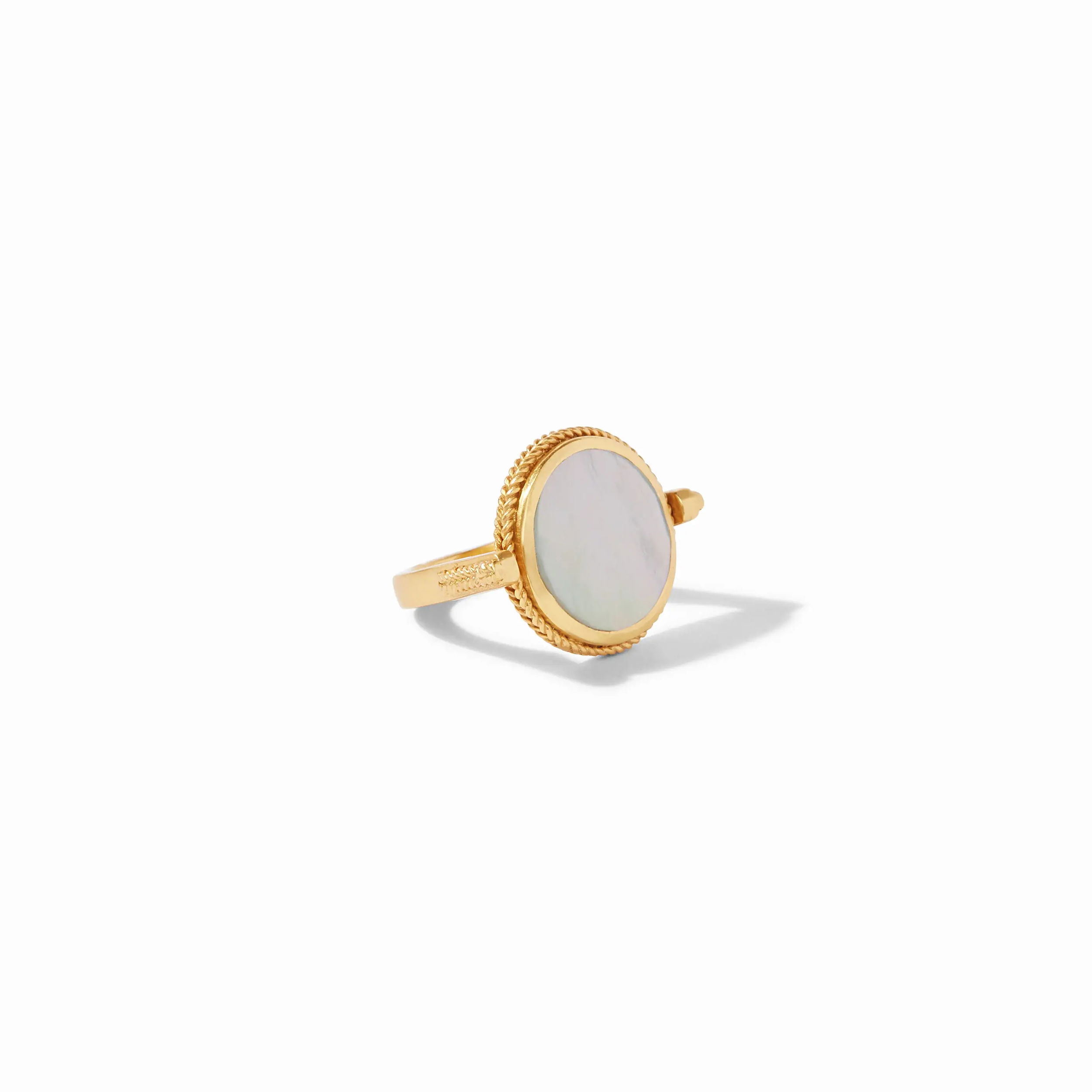 Two rings in one! A glistening gemstone of mother of pearl on one side and on the other side a gold coin of a knight on horseback with a CZ sparkle in the horse’s eye. Coin Revolving Ring