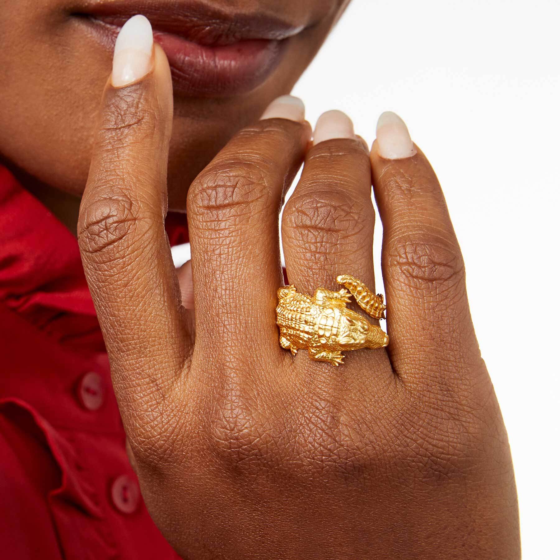 This luxurious golden alligator with glittering CZ eyes curls elegantly around your finger. Its sizing is adjustable for a perfect fit all day long. Alligator Duet Ring