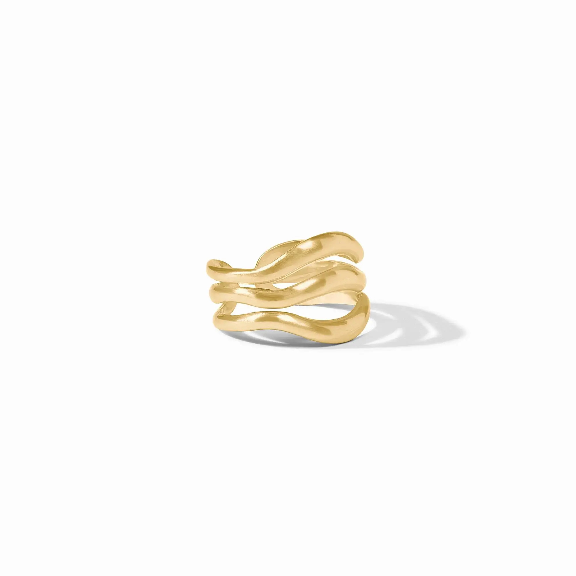 Ocean waves break upon the shore, illuminated by rays of golden hour sunlight in this airy, softly burnished ring. Wave Ring
