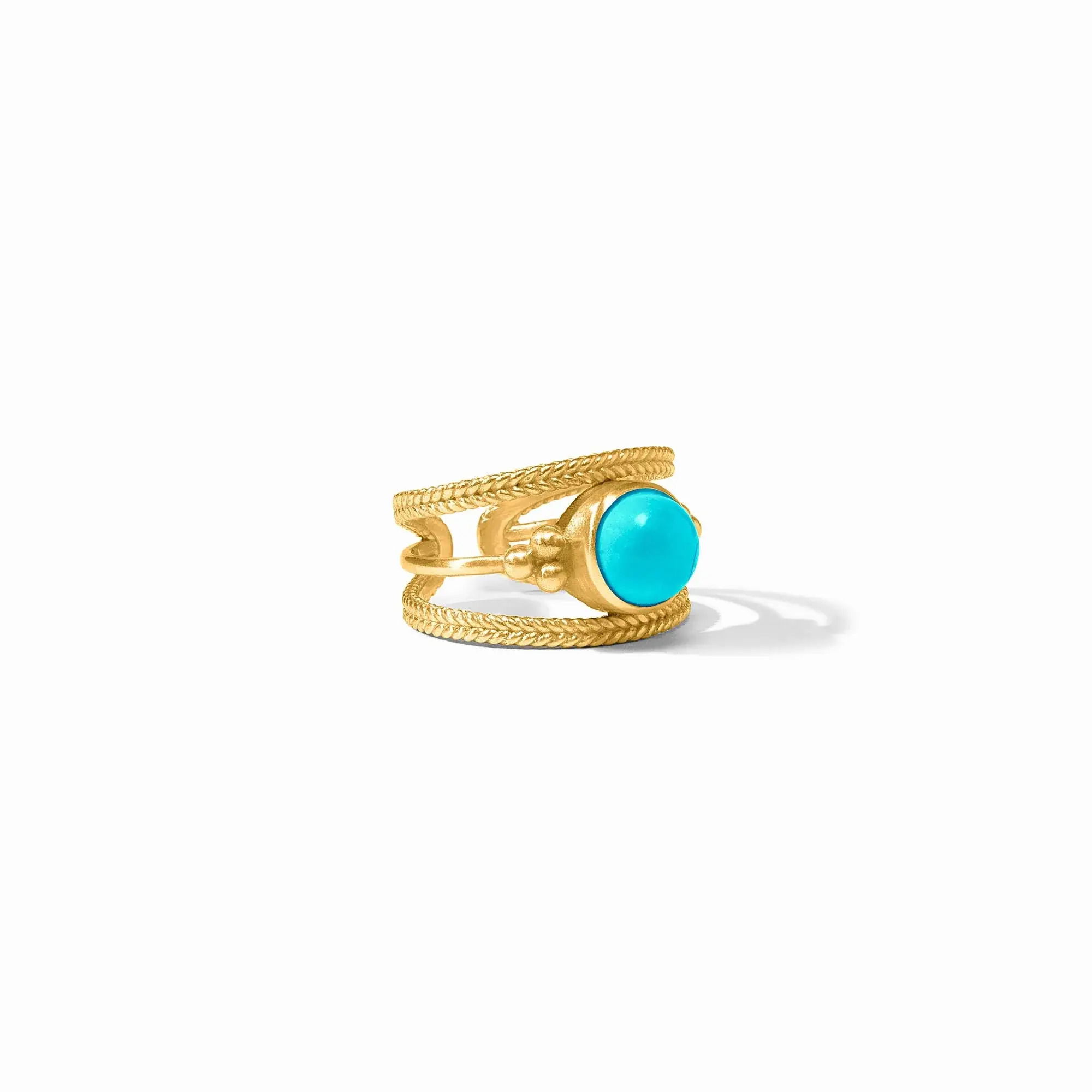 This ring recalls the jewelry of ancient Greece, with a smooth domed gemstone that appears to float between slender bands of braided golden wire, flanked by granulated details. Hydra Ring