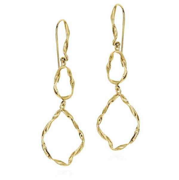Closeup photo of Irregular hook earrings in sterling silver with 18k gold vermeil