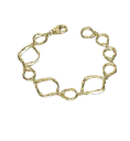 Irregular link bracelet from the Rolling by Jorge Revilla collection, crafted in 925 sterling silver with 18k gold vermeil. Its unique and organic design, with asymmetrical shapes linked fluidly, reflects a contemporary and natural style.Measuring 20 cm in length, it is a lightweight and versatile piece that adds character and elegance to any look.This design embodies the essence of Rolling, inspired by freedom, dynamism, and the imperfect beauty of nature.Metal: 925 sterling silver with 18k gold vermeilLength: 20 cmCollection: Rolling by Jorge Revilla Irregular link bracelet in sterling silver with 18k gold vermeil