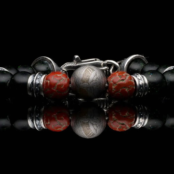 Closeup photo of Aeon - Beaded bracelet with meteorite, dinosaur bone, green goldstone and sterling silver beads