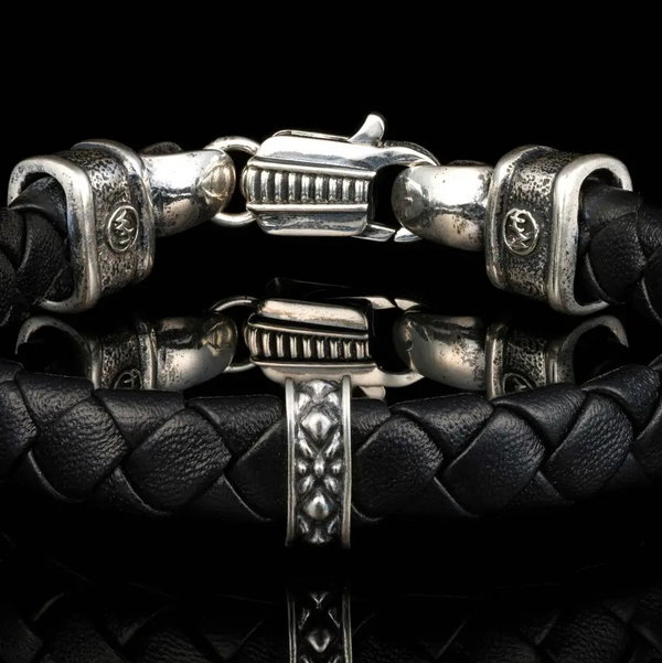 Closeup photo of Norn - Braided lambskin leather with textured and patinated sterling silver