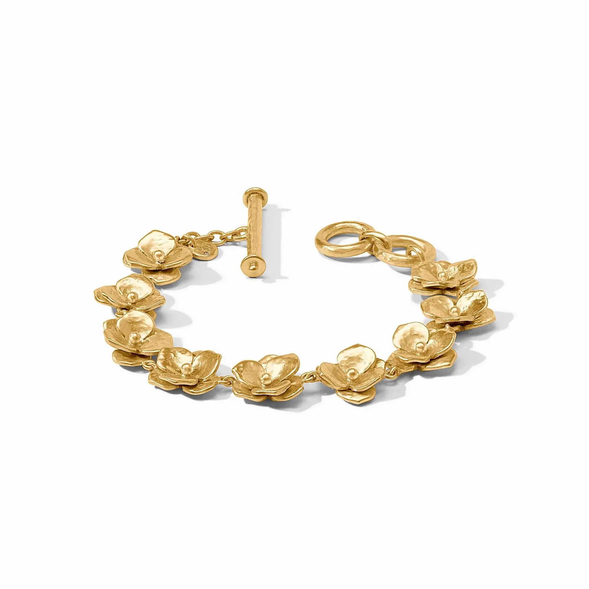 24K gold plateInner circumference: 7 / 7.5 inches (adjustable)Width: 0.6 inchesCloses with toggle Bloom Bracelet