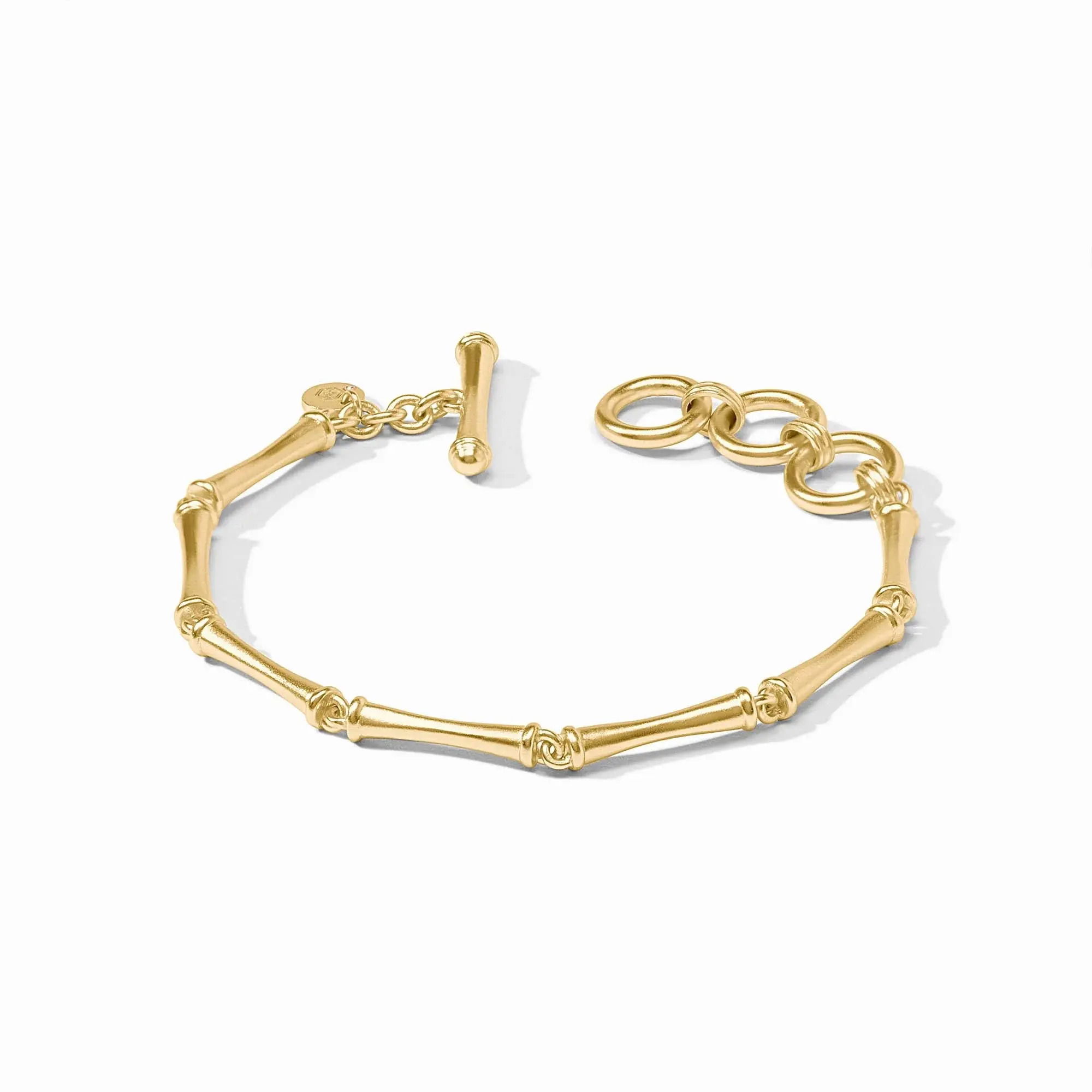 24K gold plateInner circumference: 6.75 / 7.25 / 7.75 inches (adjustable)Width: 0.1 inchesCloses with toggle Bamboo Bracelet