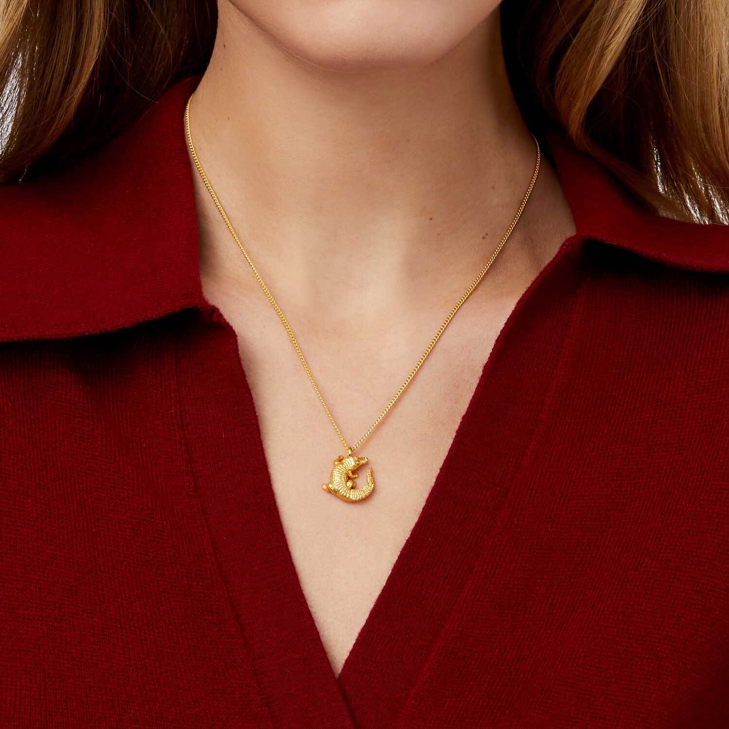 24K gold plate, CZLength: 16.5 / 17.7 inches (adjustable)Closes with spring clasp Alligator Solitaire Necklace