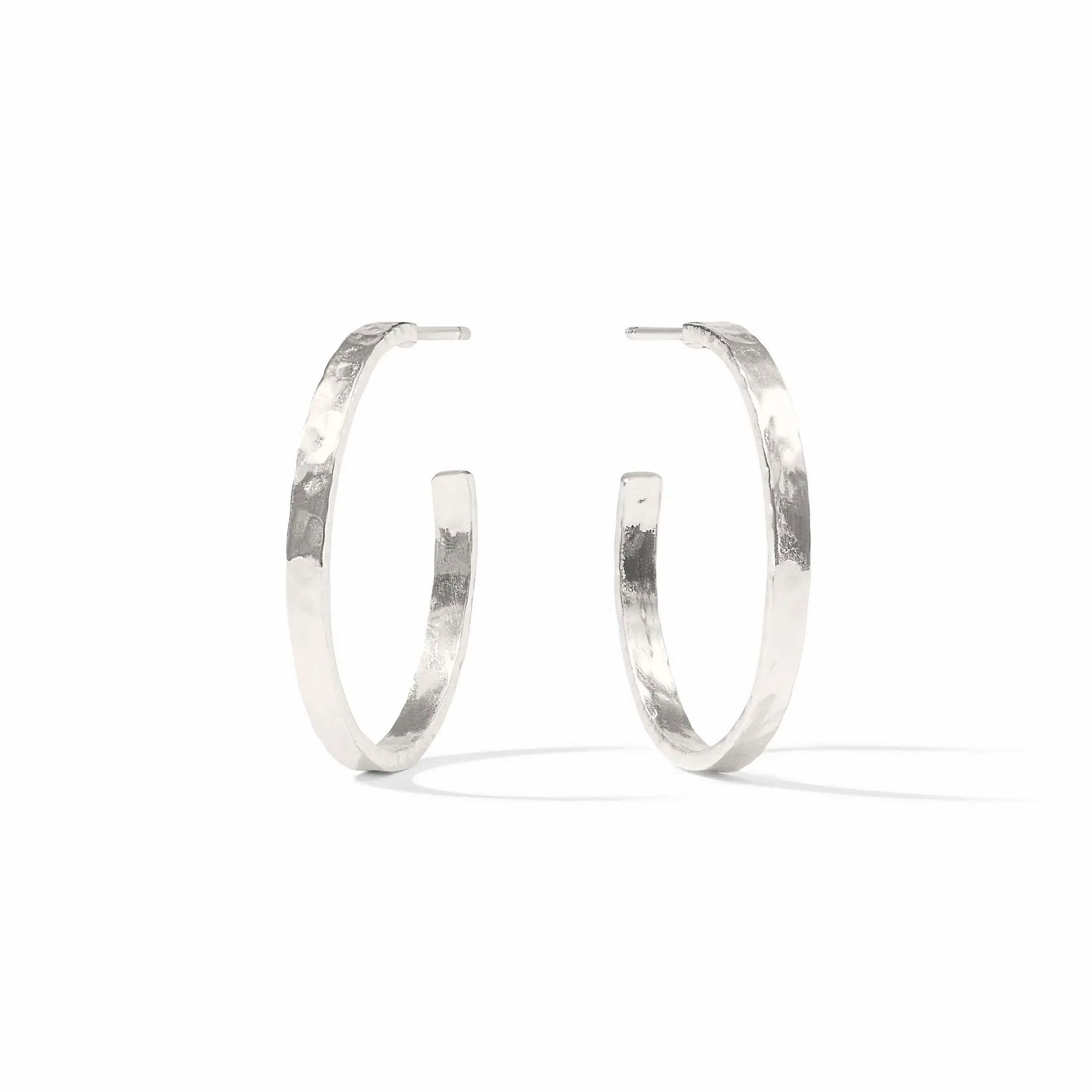 Pure silver plate (tarnish-free)Length: 1.3 inches (medium), 1.7 inches (large), 2.1 inches (extra large)Post for pierced earsIncludes pure silver plated earring backs CRESCENT HOOP SILVER