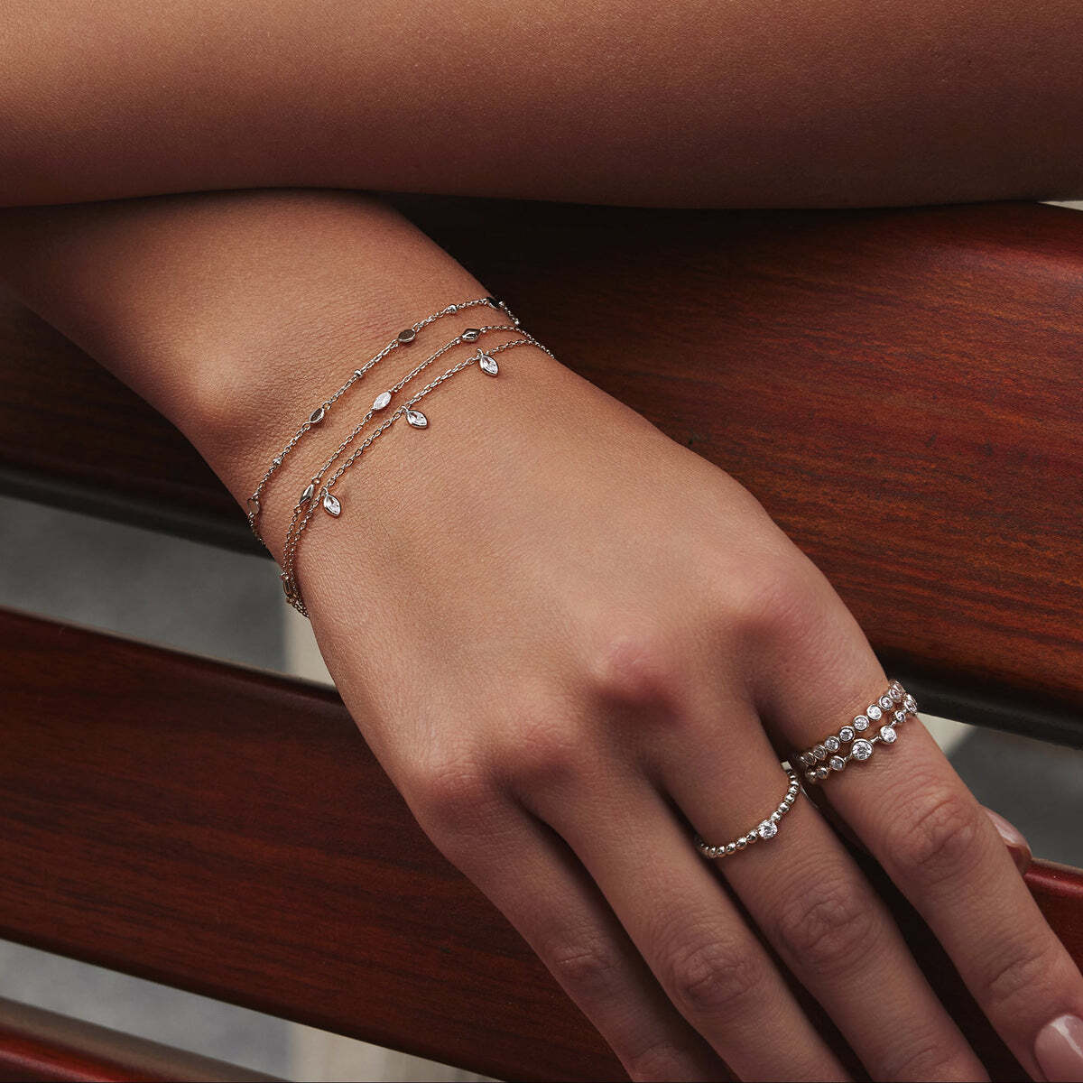 Product Description: Designed for elegance and movement, our triple station bracelet creates a captivating visual cadence with every wear. Perfect for those who love timeless grace and rhythmic beauty. You can layer up to craft your own melody, just as a poet weaves words into a poem.? Product Details: ? Material: 925 Silver Sparkling Triple Station Bracelet– Ania Haie US