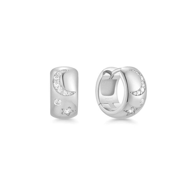 Closeup photo of Silver Celestial Chunky Huggie Hoop Earrings– Ania Haie US