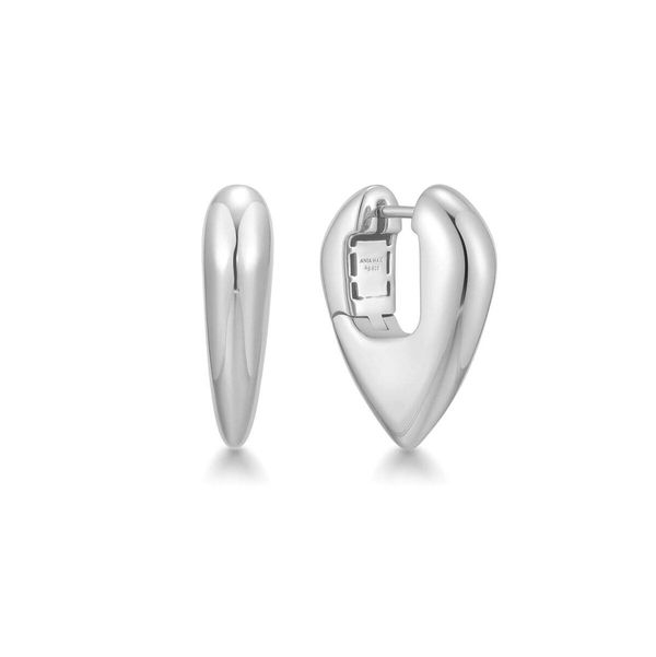 Closeup photo of Silver Puffy Shield Hoop Earrings